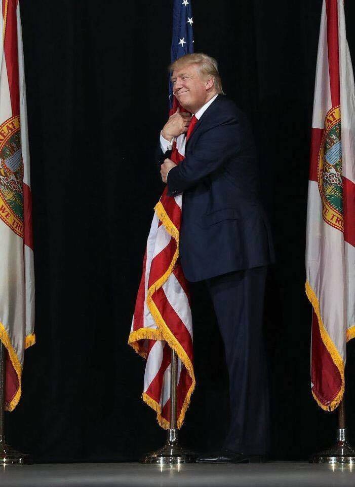 Name:  President TRUMP hugging American flag.jpg
Views: 41
Size:  60.8 KB