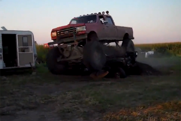 Big Red Super Duty Attempts to Crush Car; Fails