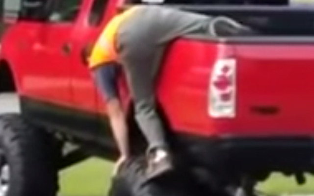Watch This Hilariously Drunk Person Fall Out of His Truck