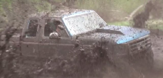 Watch a Jacked Up 1996 Ford F-150 Battle the Mud
