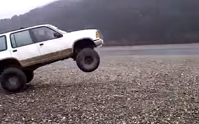 Watch a White Ford Explorer Jump & Get Vertical