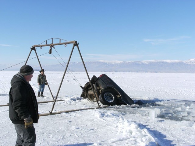 TRUCKED UP: Ice Fishing Couple Barely Escapes Truck That Falls Through Ice