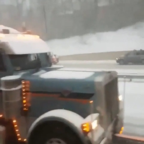 Ford Super Duty Helps Huge Tractor Trailer Climb Icy Hill!