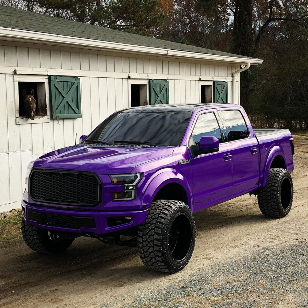 Purple Vinyl Wrapped Truck Is A BigTire Lifted Eye Catcher.