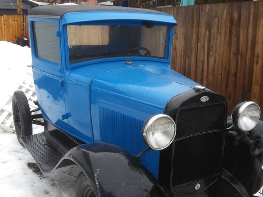 Side view of blue 1931 Ford Model A Truck