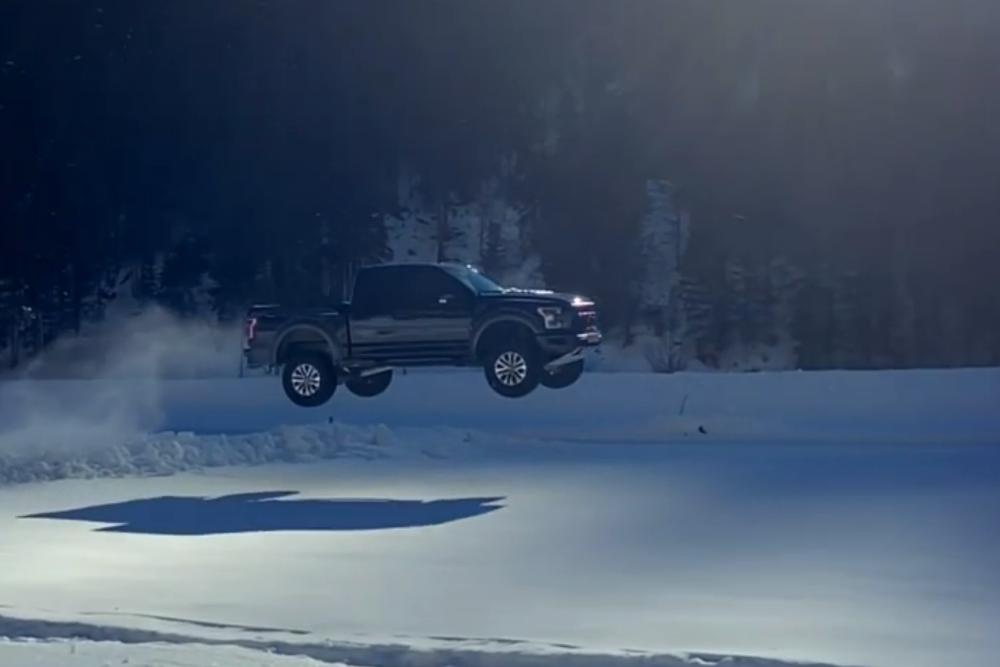 Ford F-150 Raptor Jumps Snowbank
