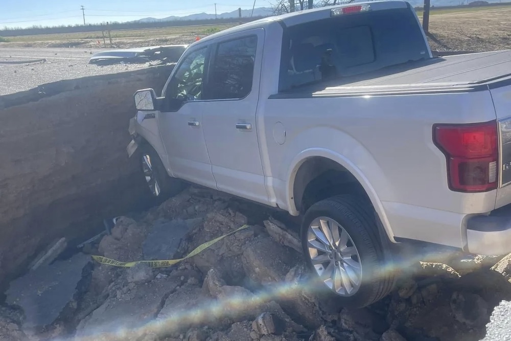 Ford F-150 Driver Ignores Road Closed Signs, Crashes Into Sinkhole - Ford -Trucks.com