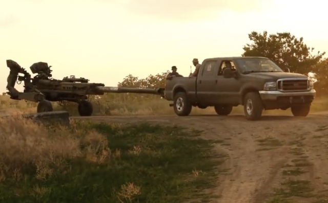 Ford Super Duty Pickup Towing M777 Howitzer In Ukraine